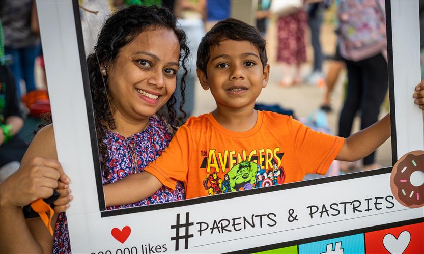 Students enjoy pastries with their parents